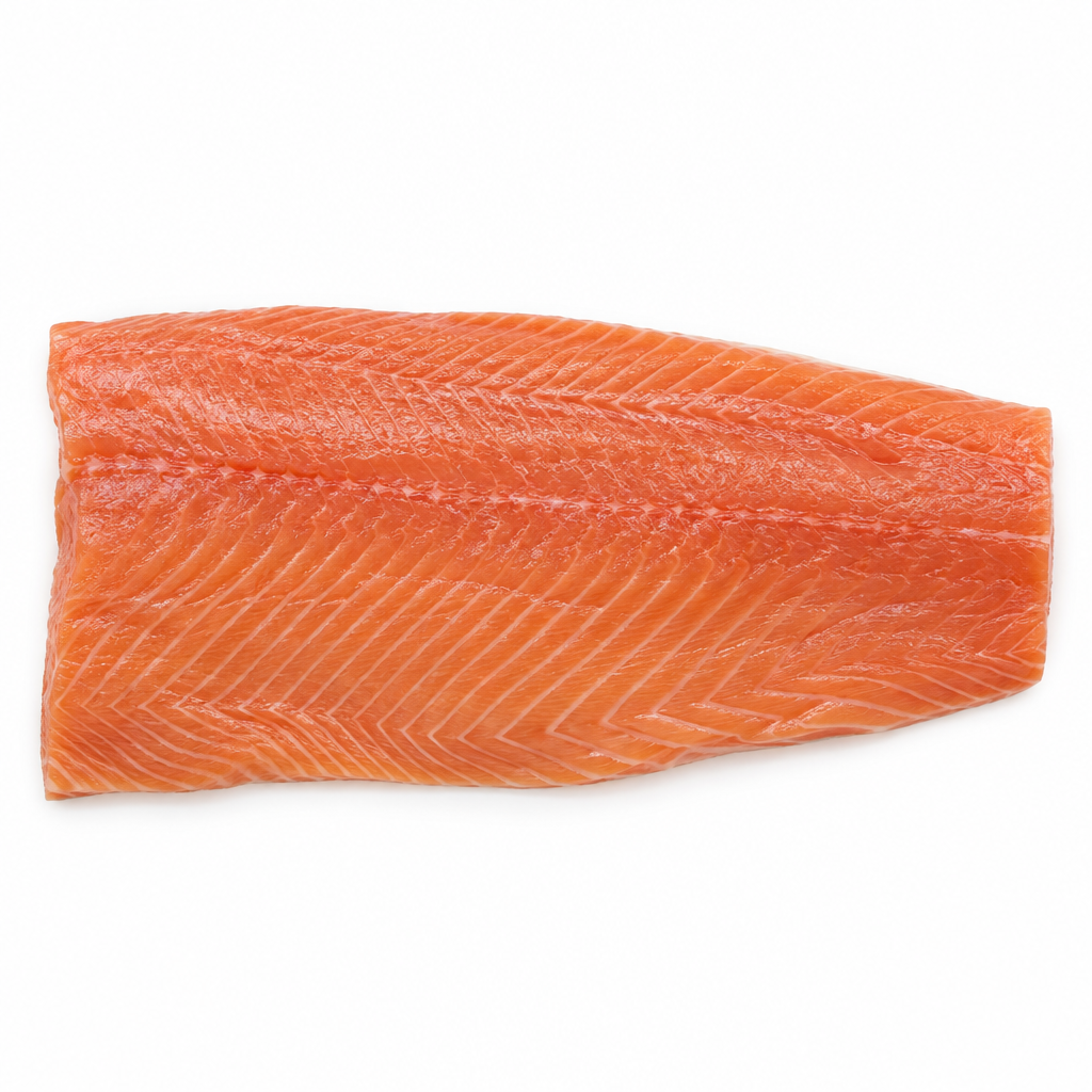 A raw salmon fillet with vibrant orange-pink flesh and white marbling, presented on a light gray marble surface.