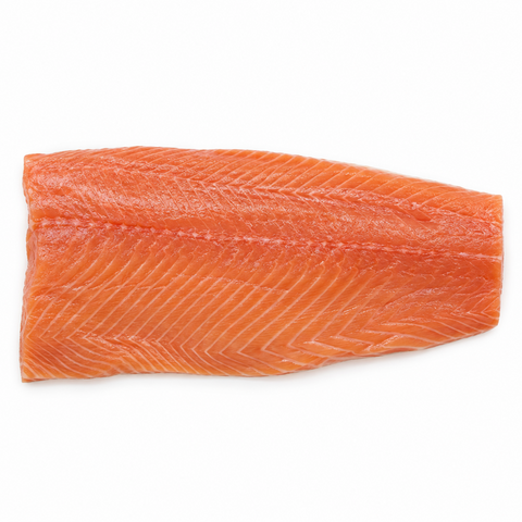 A raw salmon fillet with vibrant orange-pink flesh and white marbling, presented on a light gray marble surface.